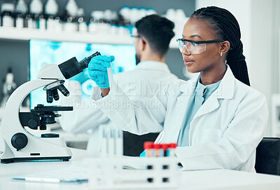 Buy stock photo Scientist, woman and microscope or blood test, research and bacteria, virus or vaccine solution in medical study. Professional doctor or science student with glass tube, biotechnology and laboratory