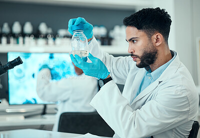 Buy stock photo Science, chemical and research with man in laboratory for liquid analysis. medical and pharmacy. Medicine, healthcare and results with scientist and beaker for virus vaccine, test and assessment