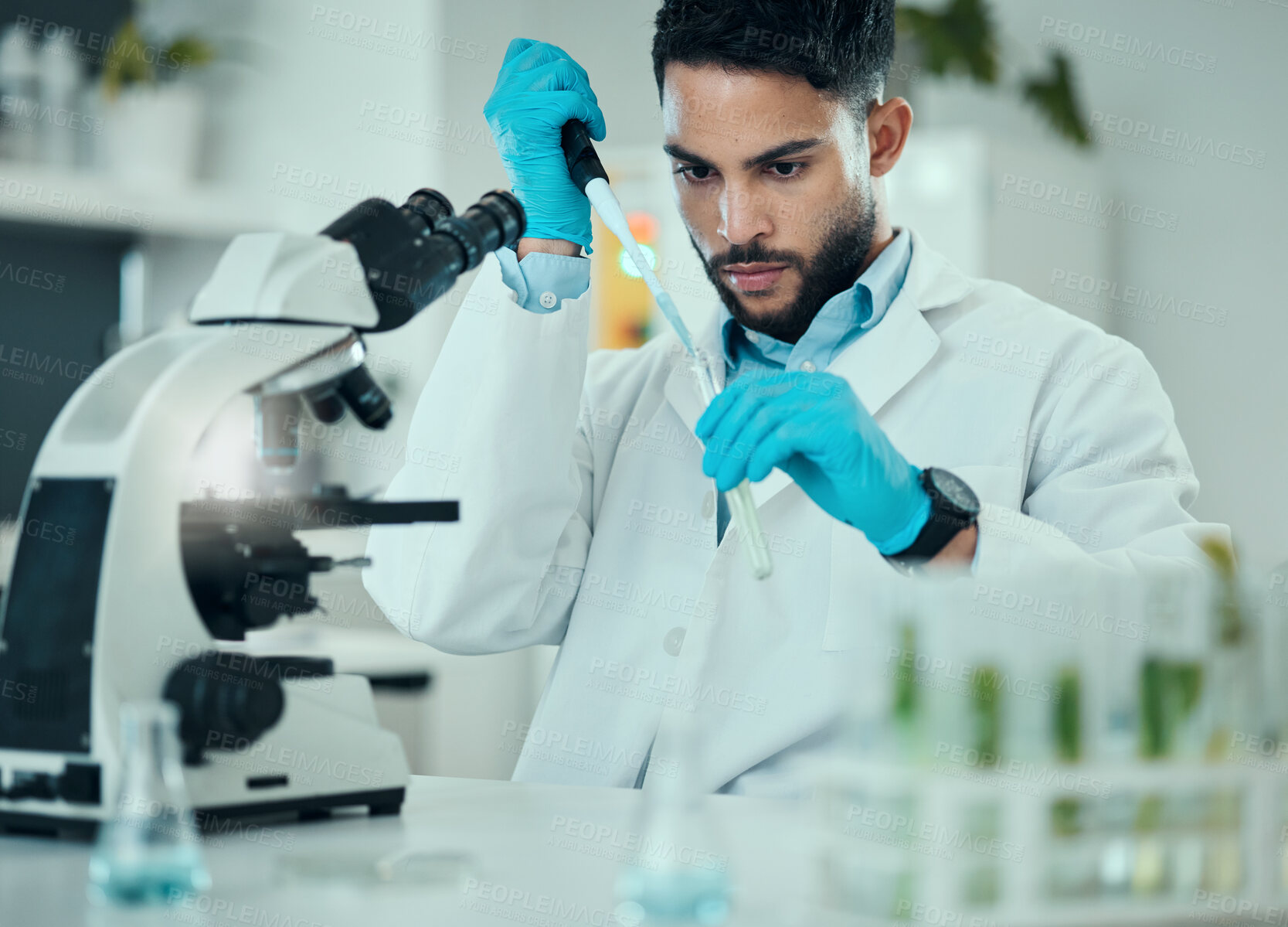 Buy stock photo Science, results and man with test tube in laboratory, research and medical engineering at microscope. Biotechnology, pharmaceutical and study, scientist or lab technician checking solution in glass.