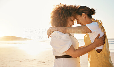 Buy stock photo Love, sunset and an lgbt couple on the beach together for romance or relationship bonding on a date. Mockup, nature and a gay woman with her lesbian girlfriend by the sea or ocean for their honeymoon