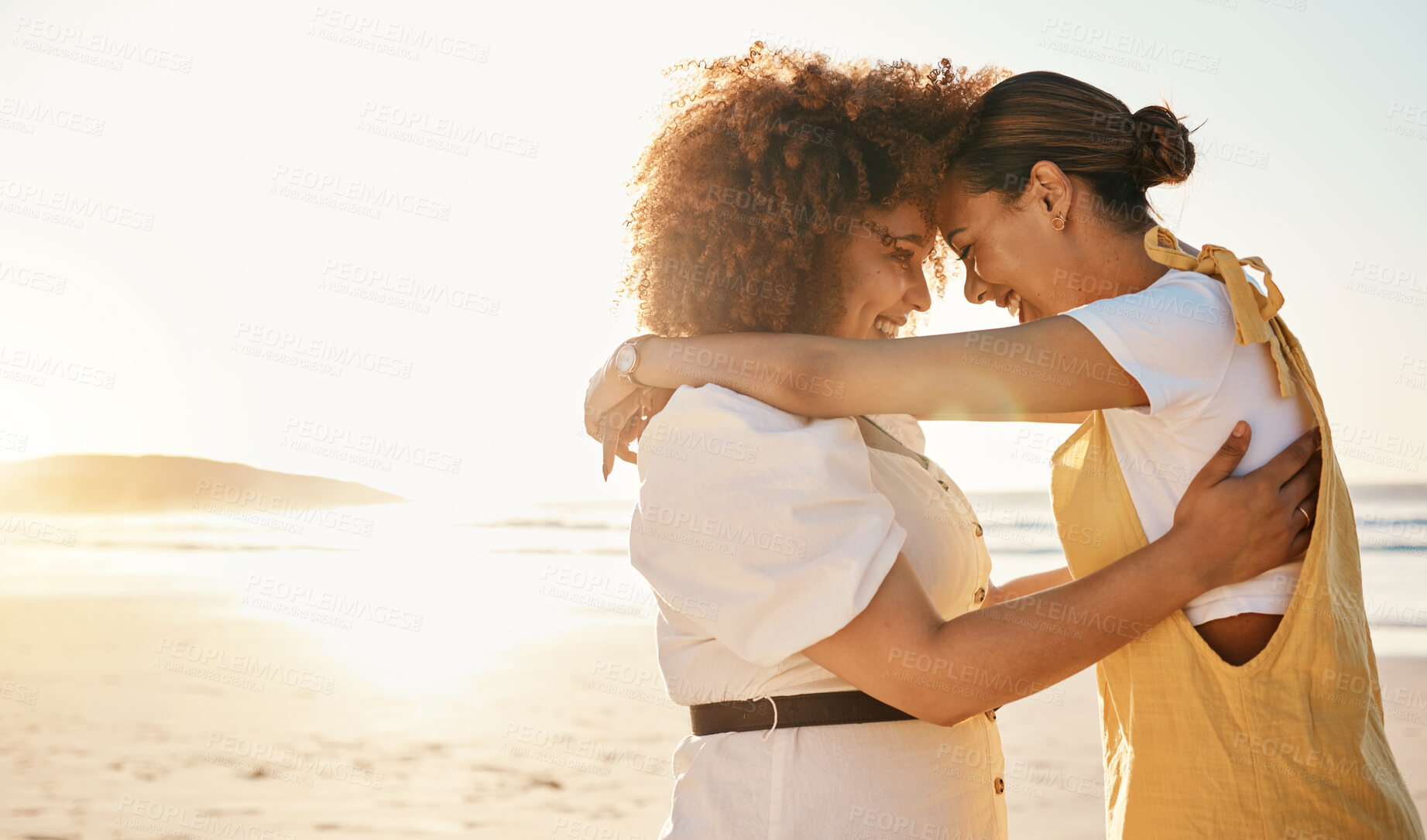 Buy stock photo Love, sunset and an lgbt couple on the beach together for romance or relationship bonding on a date. Mockup, nature and a gay woman with her lesbian girlfriend by the sea or ocean for their honeymoon