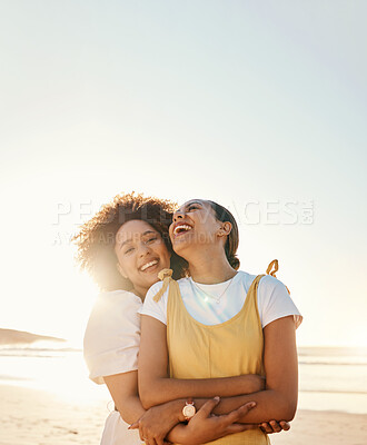 Buy stock photo Portrait, laughing and gay couple hugging on the beach together for romance or bonding on a date. Mockup, sunset and an lgbt woman with her lesbian girlfriend by the sea or ocean for their honeymoon