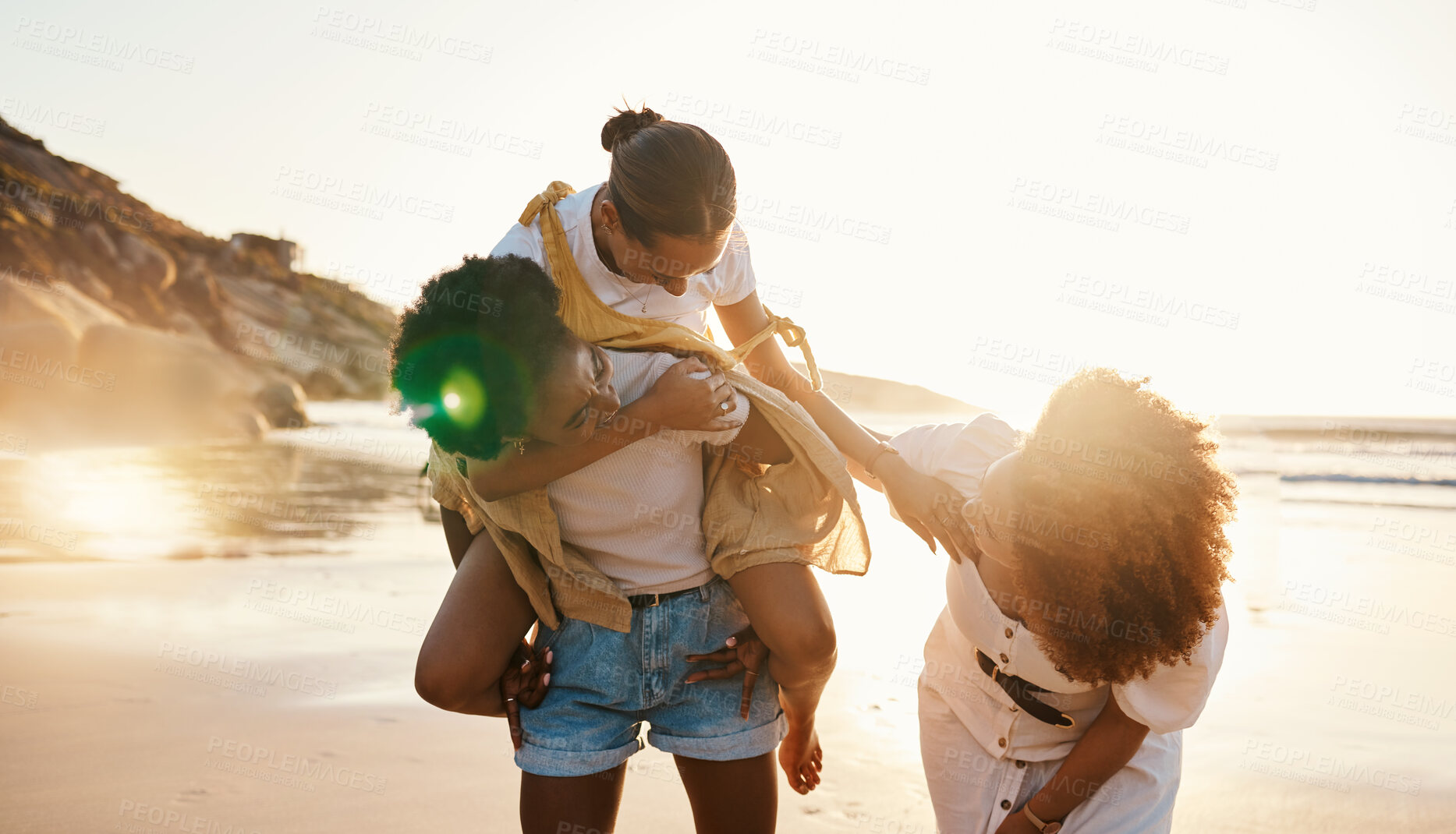 Buy stock photo Beach, sunset and friends piggyback, fun ride and reunion on social holiday, outdoor adventure and summer wellness. Sunshine flare, freedom and young women bonding on nature walk, trip or journey