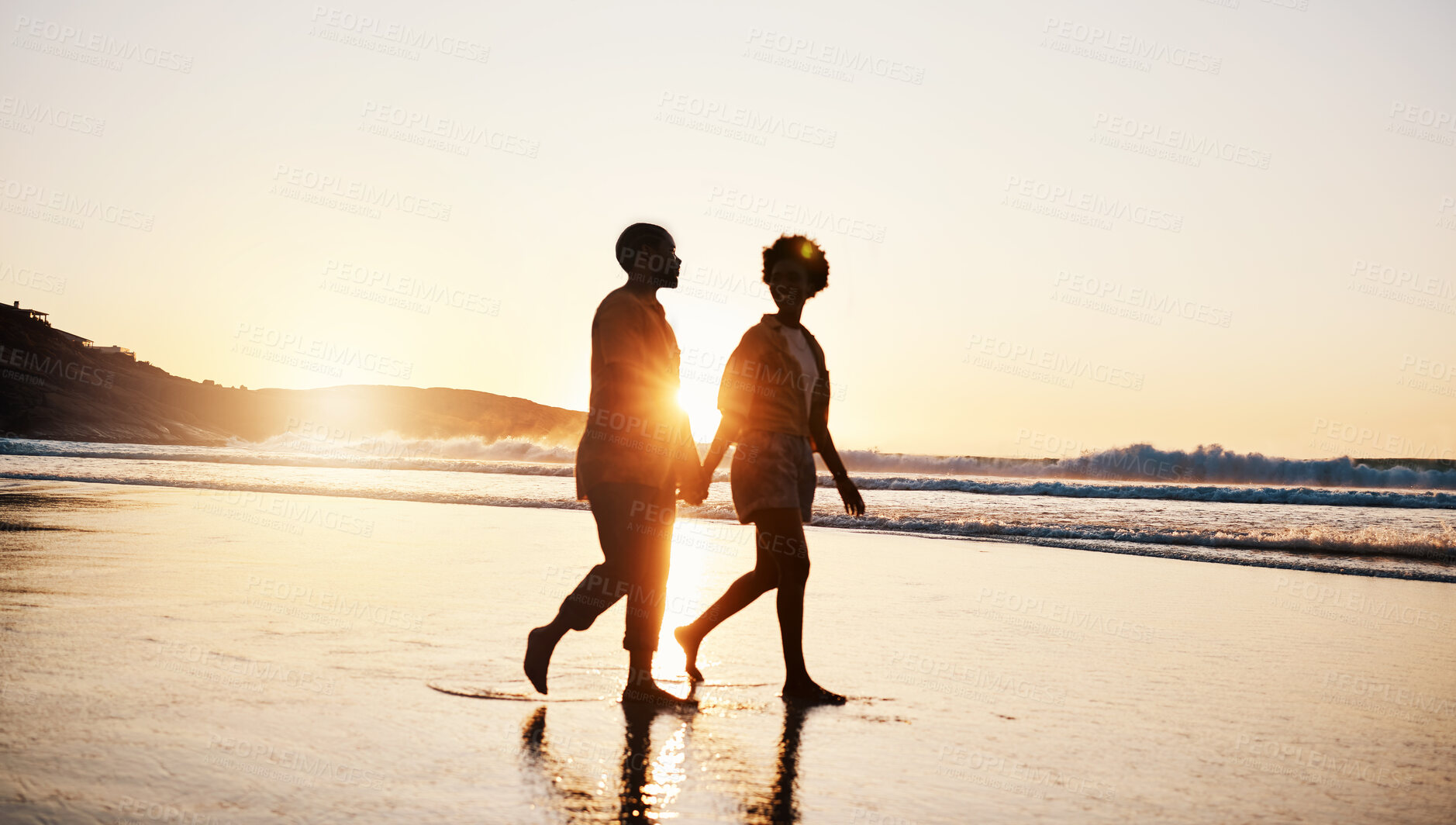 Buy stock photo Beach sunset, silhouette and couple walking, holding hands and enjoy romantic conversation, freedom and travel holiday. Love, sea and dark shadow of people bonding, talking and relax on tropical date