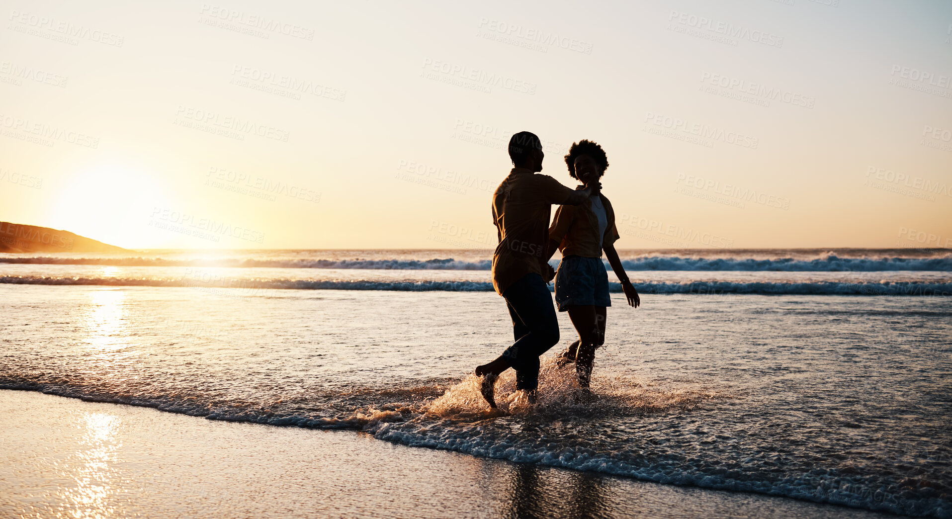 Buy stock photo Beach sunset, sea water and silhouette couple walking, connect or enjoy romantic holiday in South Africa. Love, ocean waves and dark shadow of summer people bond, talking and relax on evening journey