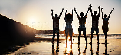 Buy stock photo Beach, celebration and back of friends at sunset with arms up for freedom, fun and travel success. Ocean, silhouette and rear view of people celebrating journey, adventure and summer vacation in Bali