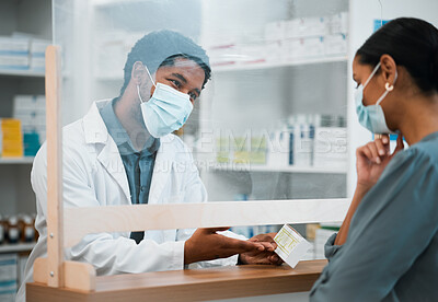 Buy stock photo Pharmacy, face mask or black man giving pills to woman patient in customer service for wellness advice. Healthcare help, African pharmacist or doctor with pharmaceutical medicine or medical product