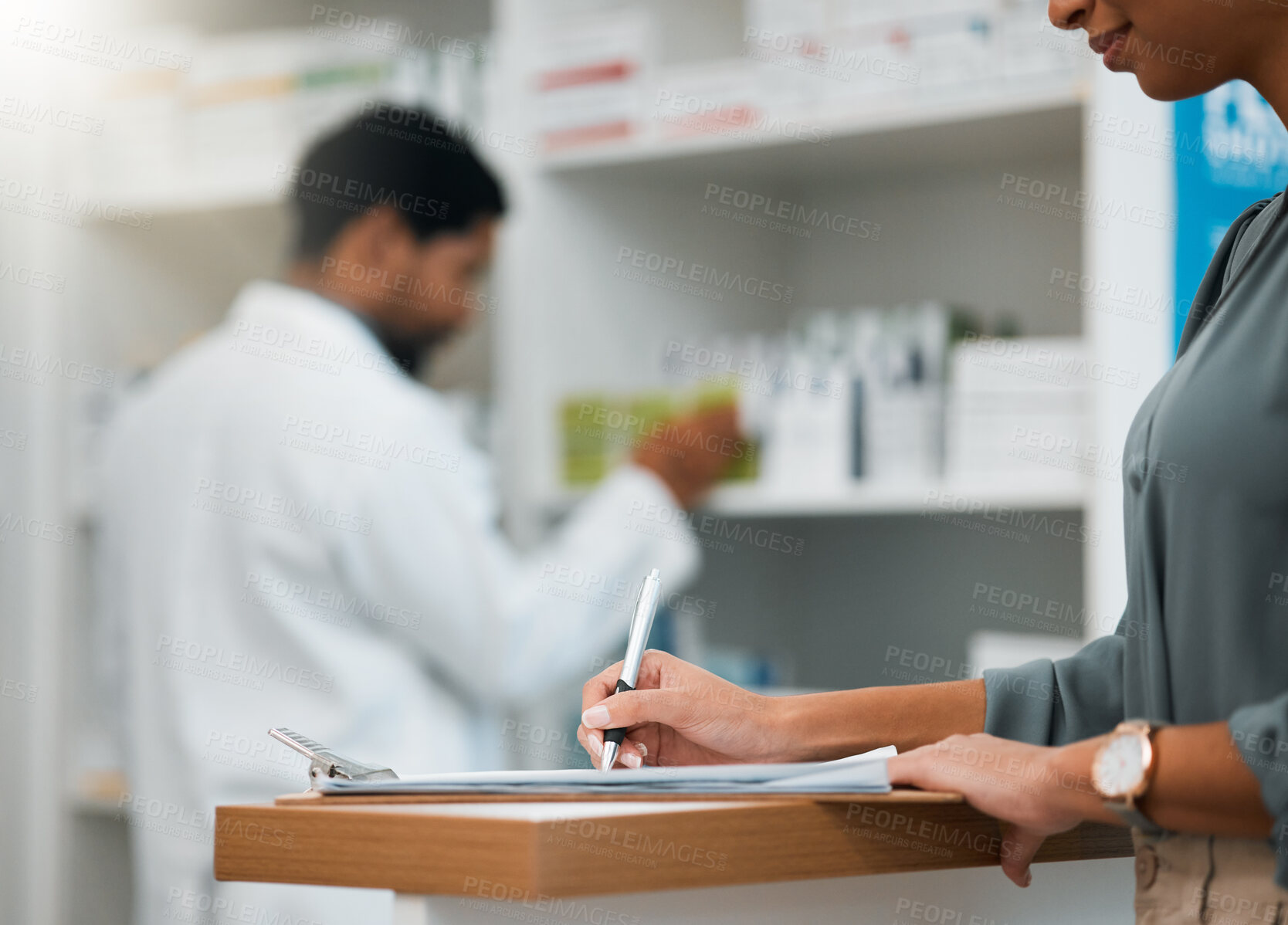 Buy stock photo Woman at pharmacy, clipboard and medical insurance information at counter for script for prescription medicine. Paperwork, writing and patient at pharmacist with application for pharmaceutical drugs.