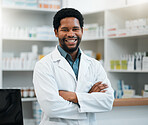 Pharmacist, black man and arms crossed for healthcare, medicine and clinic solution, service and support. Happy portrait of medical worker in pharmacy for drugs, product inventory and retail mindset