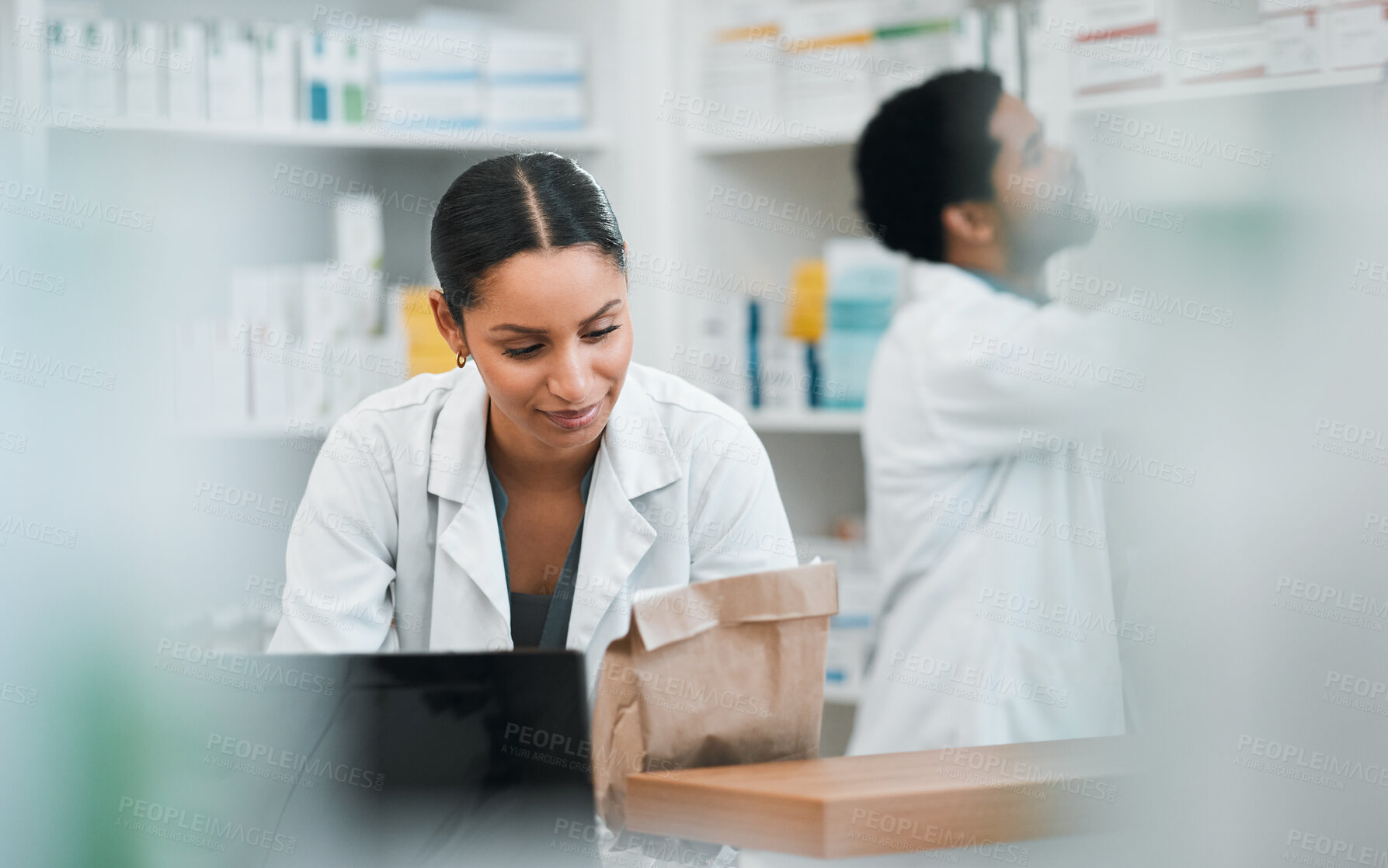 Buy stock photo Pharmacist, people and paper bag for medicine, stock inventory and retail management by help desk. Medical worker or doctor in pharmacy, drugs or product packaging for customer service in healthcare