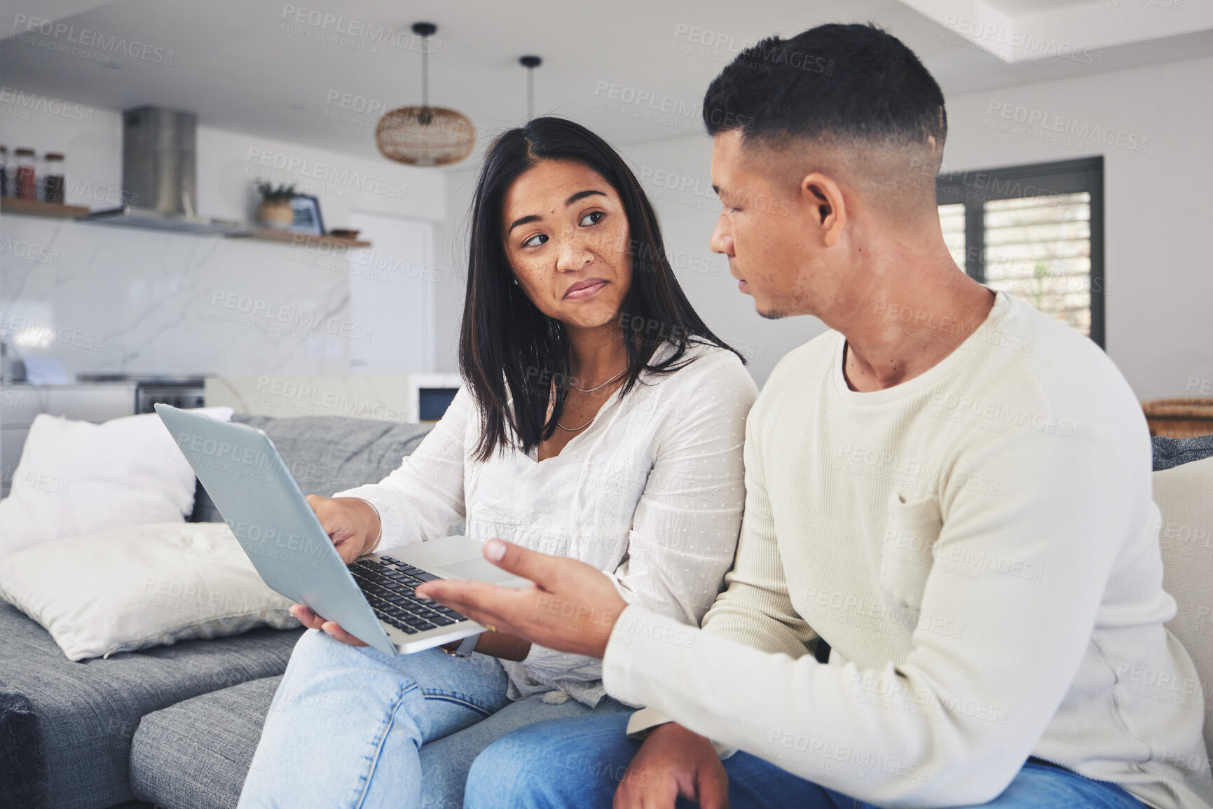 Buy stock photo Couple, laptop and decision, doubt on sofa for online shopping or business idea in living room or home. Computer, man and woman with choice on internet for financial planning with tech subscription 