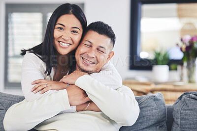 Buy stock photo Happy, portrait and woman hugging her husband while relaxing on a sofa in the living room. Smile, love and face of an Mexican female person with a man in the lounge of their modern house together.