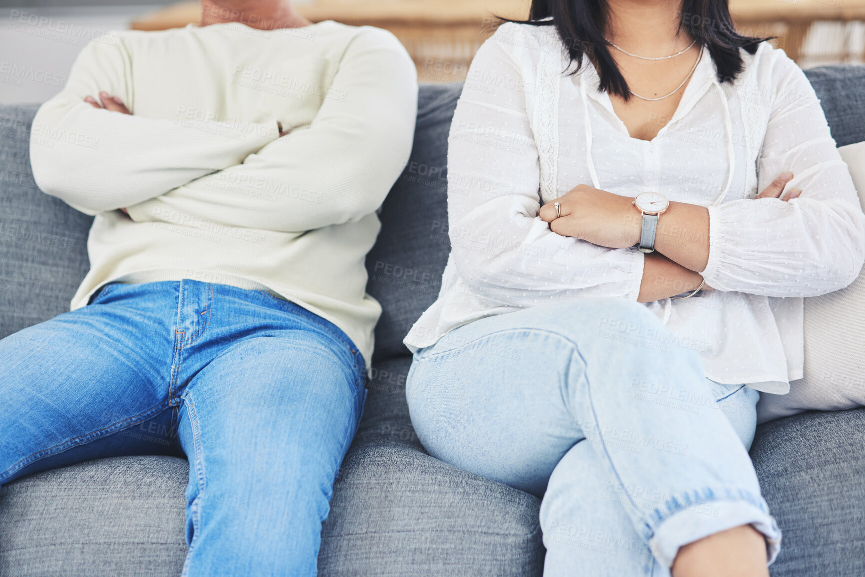 Buy stock photo Frustrated couple, hands and fight in divorce, conflict or disagreement on living room sofa at home. Closeup of man and woman in breakup, cheating affair or dispute from toxic relationship in house