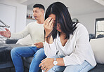 Frustrated couple, headache and fight in divorce, conflict or disagreement on living room sofa at home. Unhappy man and woman in breakup, cheating affair or dispute from toxic relationship in house