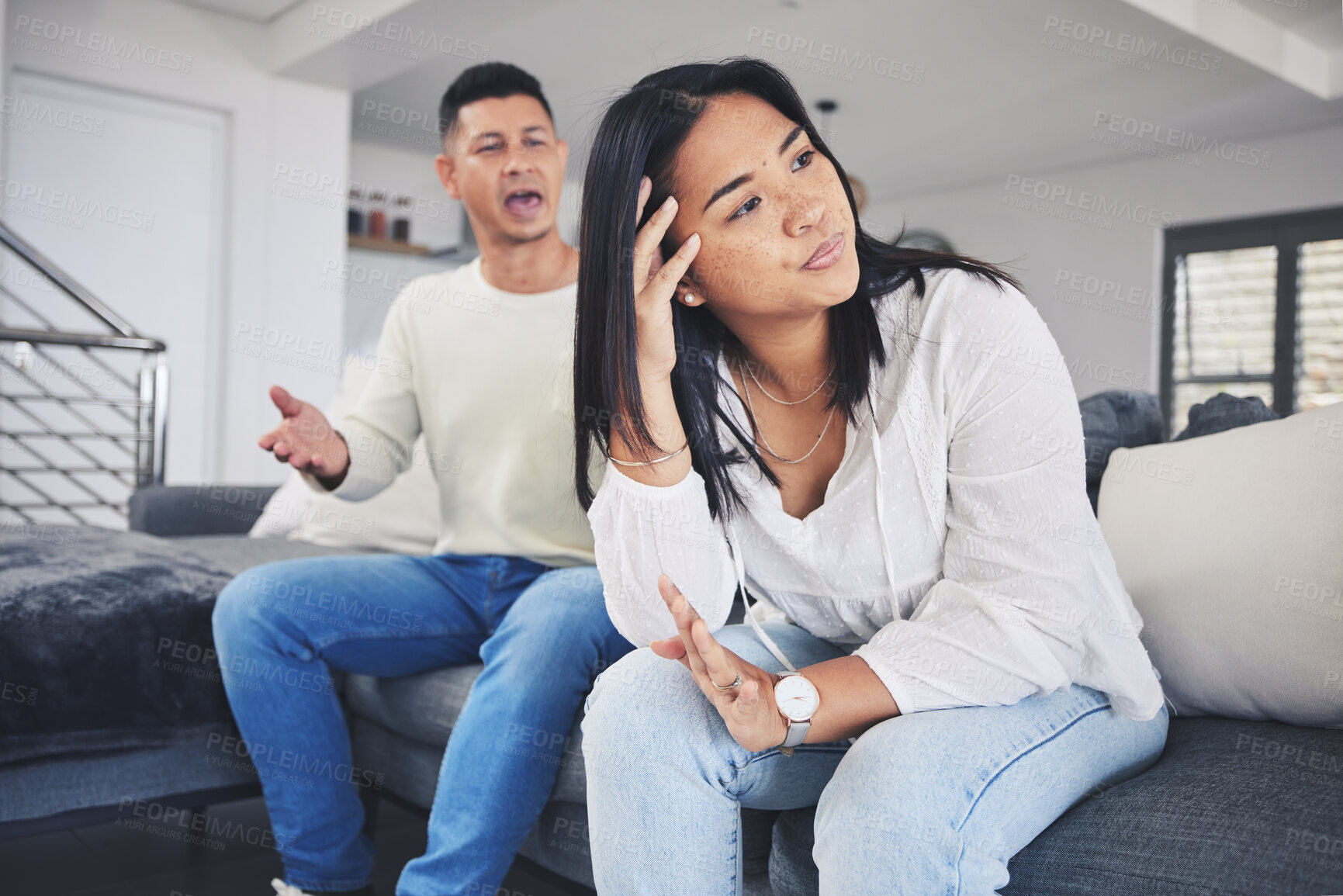 Buy stock photo Frustrated couple, headache and argument in divorce, conflict or disagreement on living room sofa at home. Unhappy man and woman in breakup, cheating affair or fight from toxic relationship in house