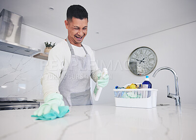 Buy stock photo Kitchen, cleaning and happy man with spray for kitchen, counter or surface care at home. Housework, spring clean and male person smile while using bacteria, dust and dirt control product in a house