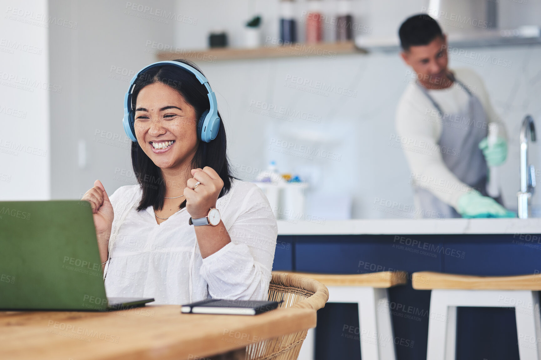 Buy stock photo Laptop, music and remote work with a winner woman in her home reading news about a bonus or promotion. Computer, celebration and headphones with a happy young entrepreneur cheering freelance success