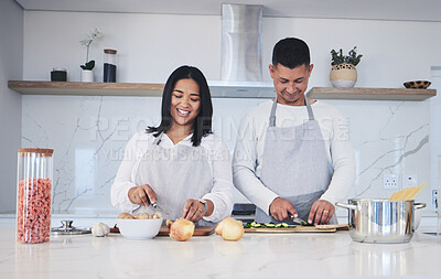 Buy stock photo Happy, cooking and love with couple in kitchen for food, health and lunch recipe. Smile, nutrition and dinner with man and woman cutting vegetables at home for diet, wellness and romance together