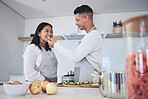 Feeding, cooking and love with couple in kitchen for food, health and lunch recipe. Happy, nutrition and dinner with man and woman cutting vegetables at home for diet, wellness and romance together