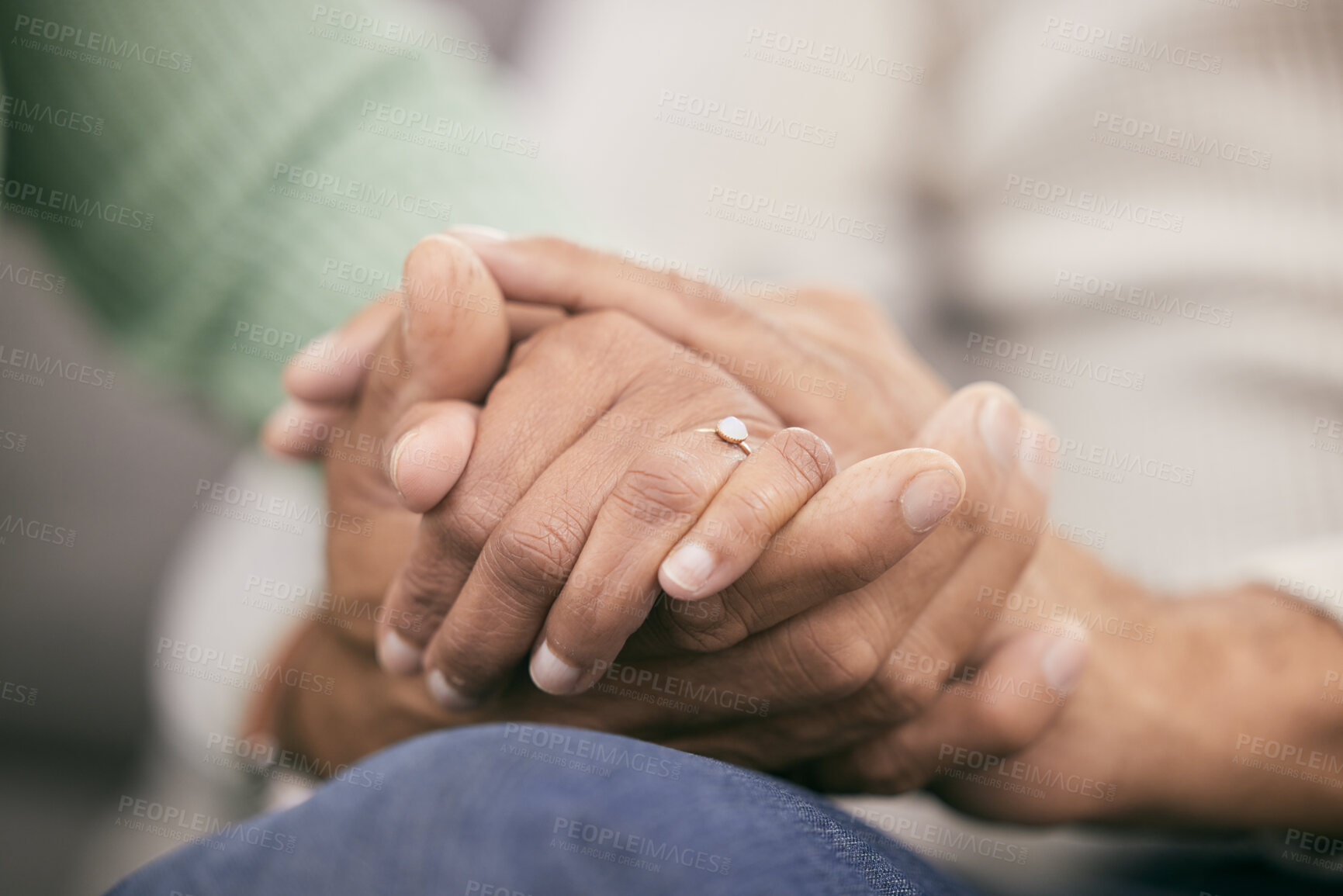 Buy stock photo Couple holding hands for support, love and care of trust together in marriage relationship at home. Closeup of man, woman and helping hand of life partner with loyalty, commitment or hope for empathy