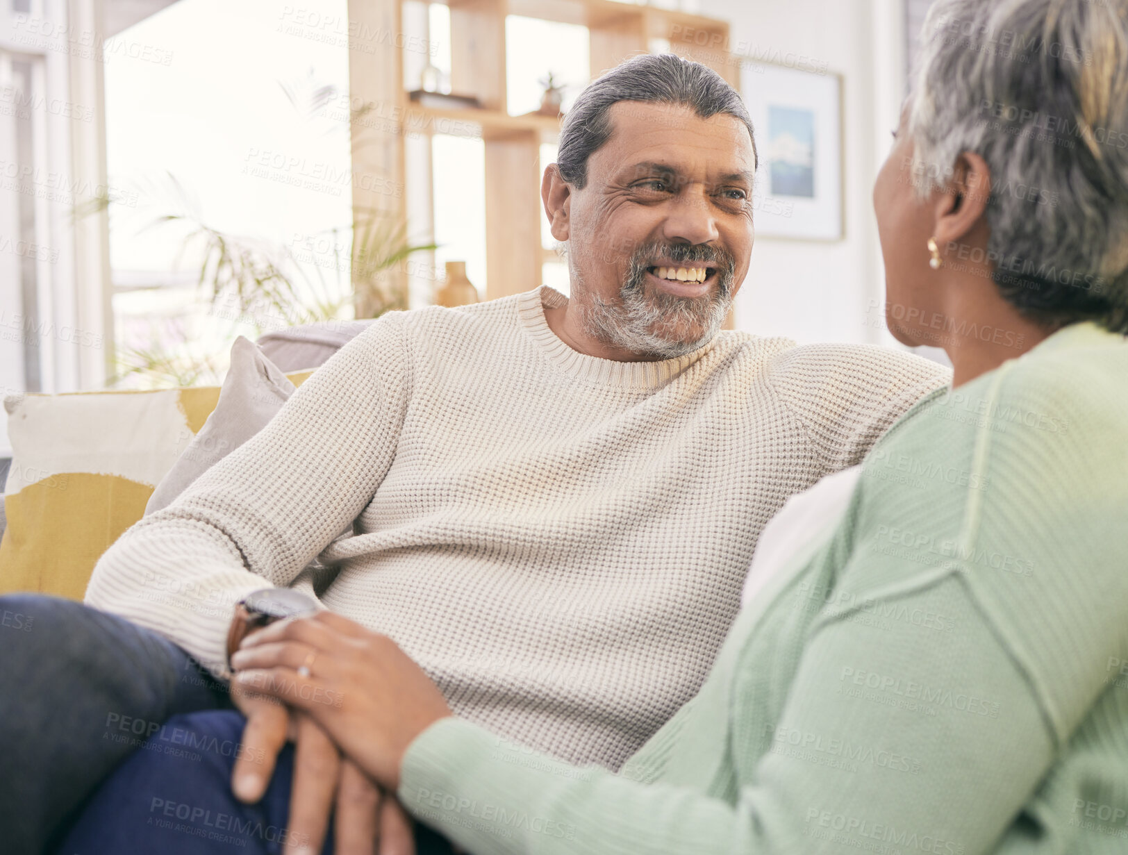 Buy stock photo Happy, talking and mature couple on sofa for bonding, healthy relationship and connection. Marriage, love and man and woman relaxing on couch for discussion, conversation and chat in living room