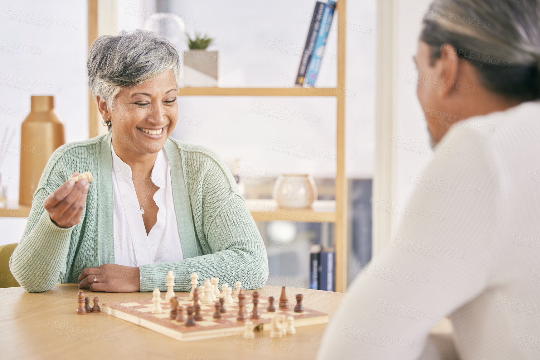 Buy stock photo Chess, happy and senior couple play games for relaxing, bonding and spending time together at home. Marriage, retirement and man and woman enjoying board game for challenge, strategy and thinking