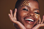 Gold, laughing and woman face closeup with makeup and luxury treatment with rich spa mask. Glitter, golden dermatology and African female person happy from skincare and golden cosmetics in studio