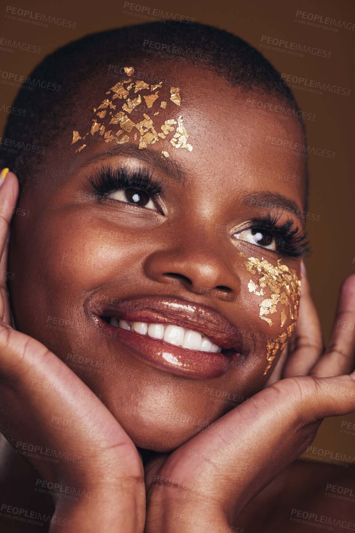 Buy stock photo Gold, makeup and woman face closeup with a smile from luxury treatment and facial spa mask. Glitter, golden dermatology and African female person happy from skincare and golden cosmetics in studio