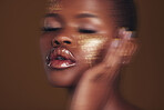 Gold beauty, makeup and  woman skincare with blur in studio with glitter cosmetics and sparkle art. Brown background, African female model and shine from paint and glow with golden luxury treatment