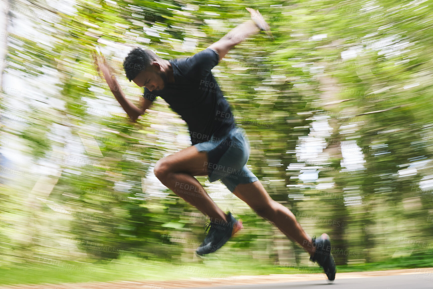 Buy stock photo Running, fitness and blur of man in forest for marathon training, exercise and cardio workout. Sports, race and athlete with speed for wellness, performance and endurance for challenge in nature