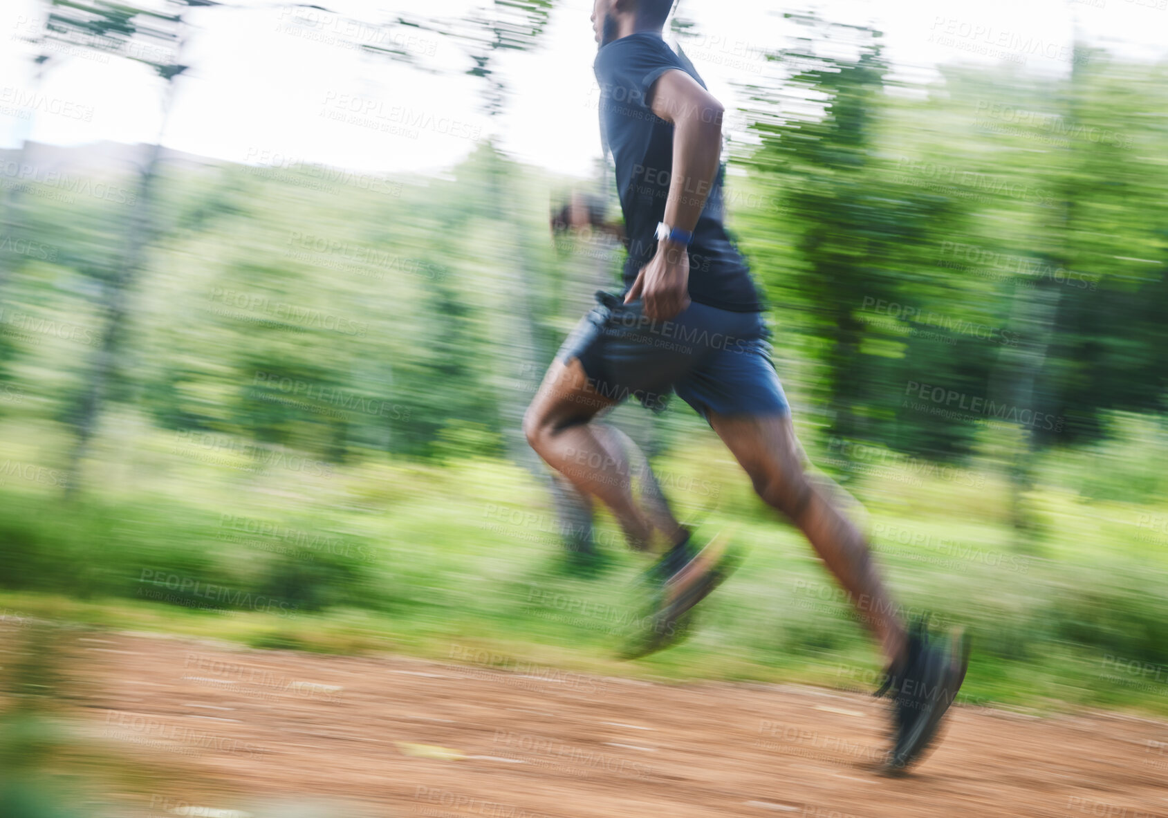 Buy stock photo Sports man, speed and running in forest with motion blur, cardio workout and exercise action. Runner, fast athlete and training for marathon challenge with energy, dynamic fitness and power in park 