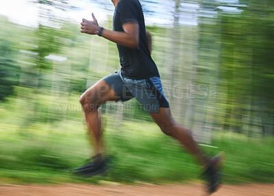 Buy stock photo Running, speed and blur of man in forest for marathon training, exercise and cardio workout. Sports, fitness and fast athlete in nature for wellness, healthy body and endurance for race or challenge