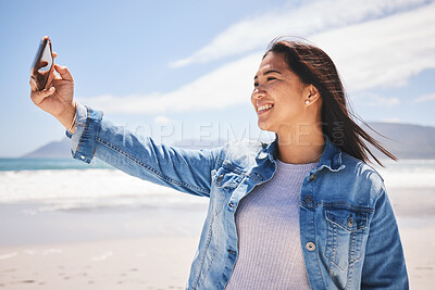 Buy stock photo Phone, selfie and happy woman on beach for holiday, vacation or summer in Indonesia or profile picture for social media. Person, smile and post memory of the ocean, sea or relax in nature for break