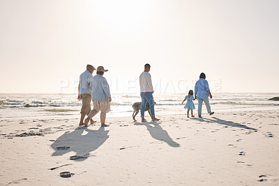 Buy stock photo Summer, travel and walking with big family on beach for vacation, bonding and love. Freedom, care and relax with group of people on seaside holiday for generations, happiness and mockup space