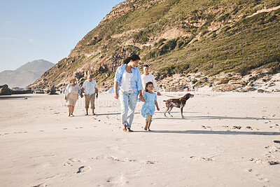 Buy stock photo Family, walking and outdoor with a dog at the beach in summer for fun, freedom and vacation. People, child and a pet travel on sand at sea on holiday with health, love and happiness in nature