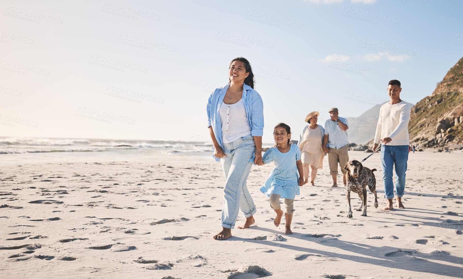 Buy stock photo Family, beach and walking outdoor with a dog in summer for fun, freedom and vacation. People, child and a pet travel together on sand at sea on holiday with space, love and happiness in nature