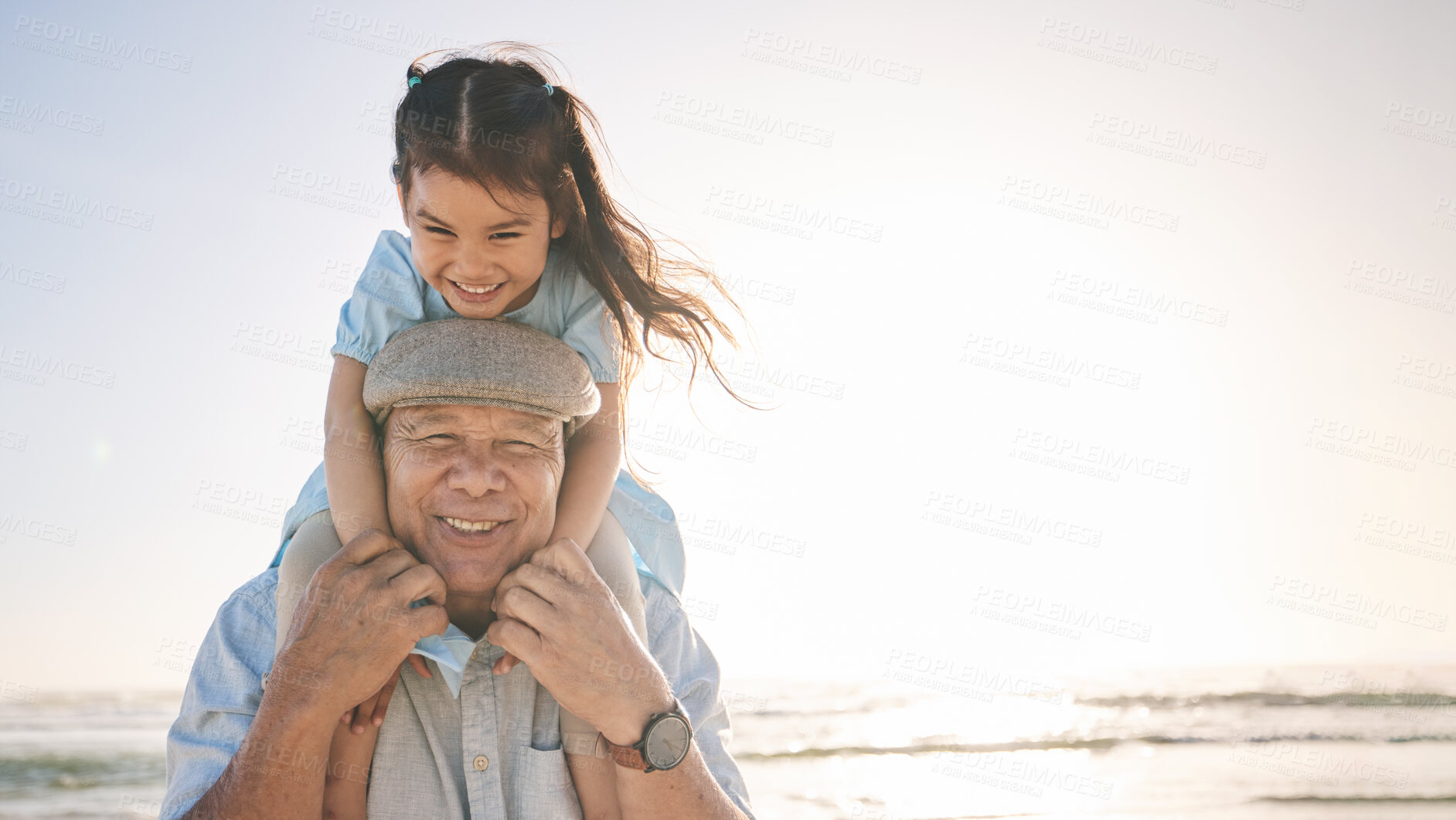 Buy stock photo Portrait, sunset and a girl with her grandpa on the beach for a holiday or vacation during retirement. Mockup, smile or love with a happy senior man and granddaughter by the ocean or sea in summer