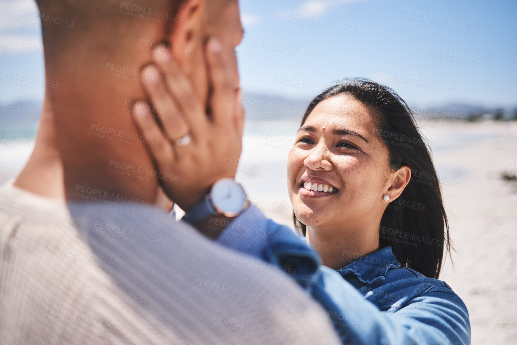 Buy stock photo Beach, love and couple with hands on face for love, commitment and bonding in nature. Travel, summer and man and woman together by ocean for care, trust and affection on holiday, vacation and weekend