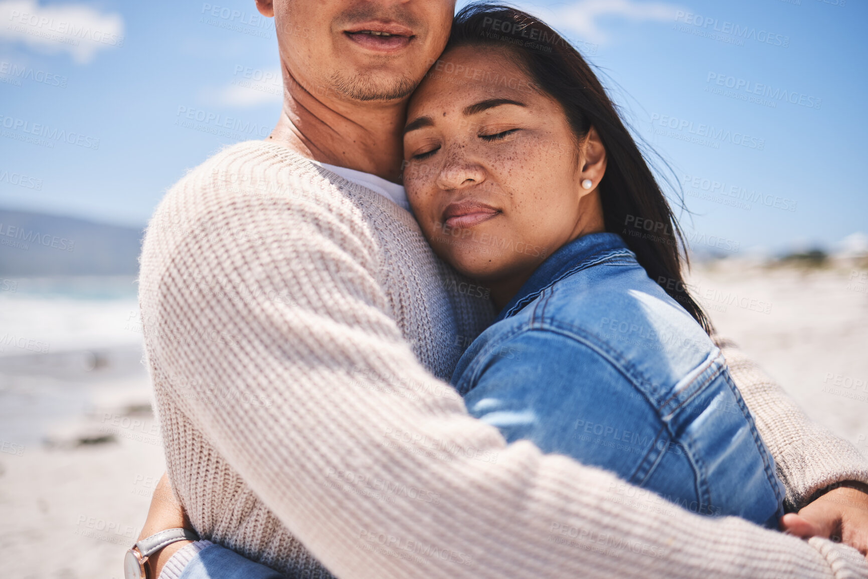 Buy stock photo Love, hug and relax with couple at beach for travel, summer vacation and romance together. Calm, embrace and bonding with man and woman walking on seaside holiday for care, date or honeymoon