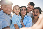 Happy, selfie and portrait of big family on the beach for tropical vacation or adventure together. Smile, love and girl child taking picture with her parents and grandparents by the ocean on holiday.