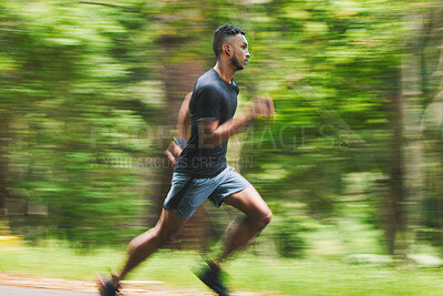 Buy stock photo Sports man, action and running in park with speed, cardio workout or power of motion blur. Runner, athlete or training for marathon race with energy, dynamic exercise or fast performance pace outdoor