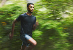 Sports man, speed and running in park with motion blur, cardio workout and fitness action. Runner, athlete and focus for marathon race with energy, dynamic exercise and fast performance pace outdoor