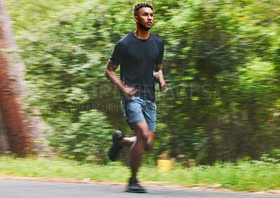 Buy stock photo Man running with speed in park for exercise, fitness and power of cardio workout, action and race. Runner, sports athlete and motion blur for marathon training, energy and fast performance outdoor 