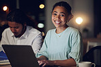Night, portrait and happy woman in office with laptop, teamwork and typing email, report or review. Overtime, computer and business people in workplace with smile, online schedule planning and bokeh.