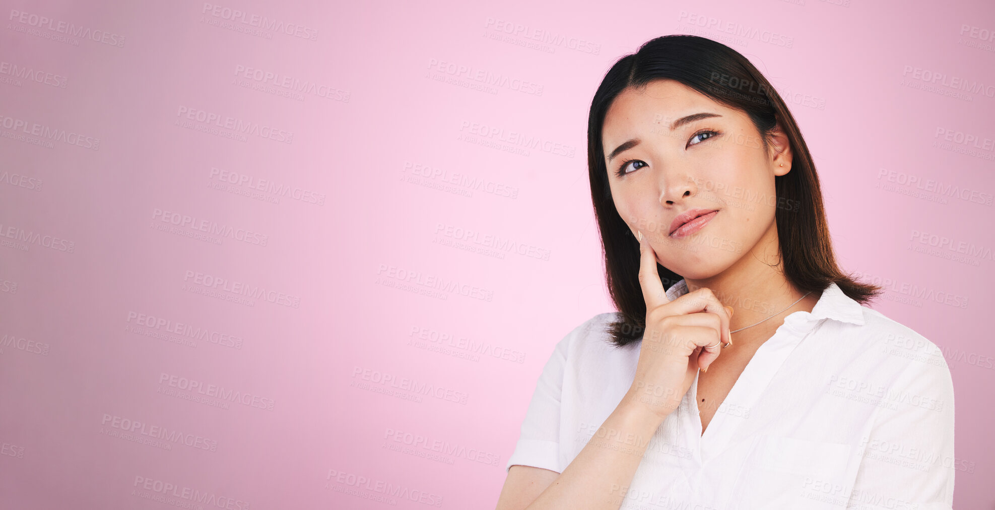 Buy stock photo Asian woman, thinking and decision on mockup in problem solving against a pink studio background. Female person with idea, solution or choice in memory, reminder or  brainstorming on mock up space