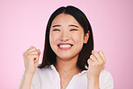 Happiness, studio face and asian woman celebrate success, achievement or winning promotion deal, giveaway or competition. Prize winner, award celebration or Japanese person excited on pink background