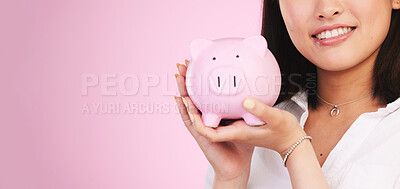 Buy stock photo Woman, piggy bank and mockup space in savings, investment or financial growth against a pink studio background. Female person, banner and hands holding piggybank in finance or profit on mock up