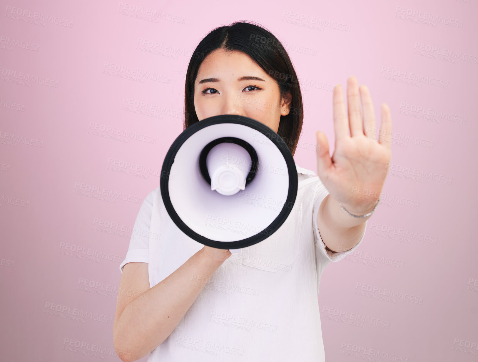 Buy stock photo Megaphone announcement, portrait and Asian woman with stop hand sign for justice,  human rights rally and end racism. Warning speech, studio and Japanese female speaker revolution on pink background