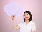 Happy asian woman, portrait and speech bubble on mockup space against a pink studio background. Female person smile with shape, icon or symbol in communication, quote or social media on mock up
