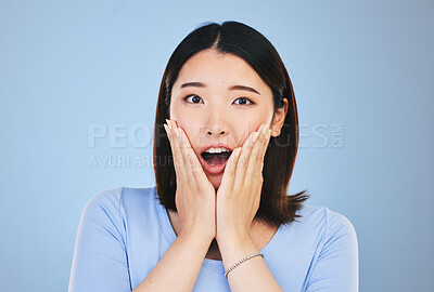 Buy stock photo Asian, portrait and woman with surprise from announcement, news or horror story on blue background in studio. Shock, face and person with wow deal, discount or emoji for crazy promotion and offer